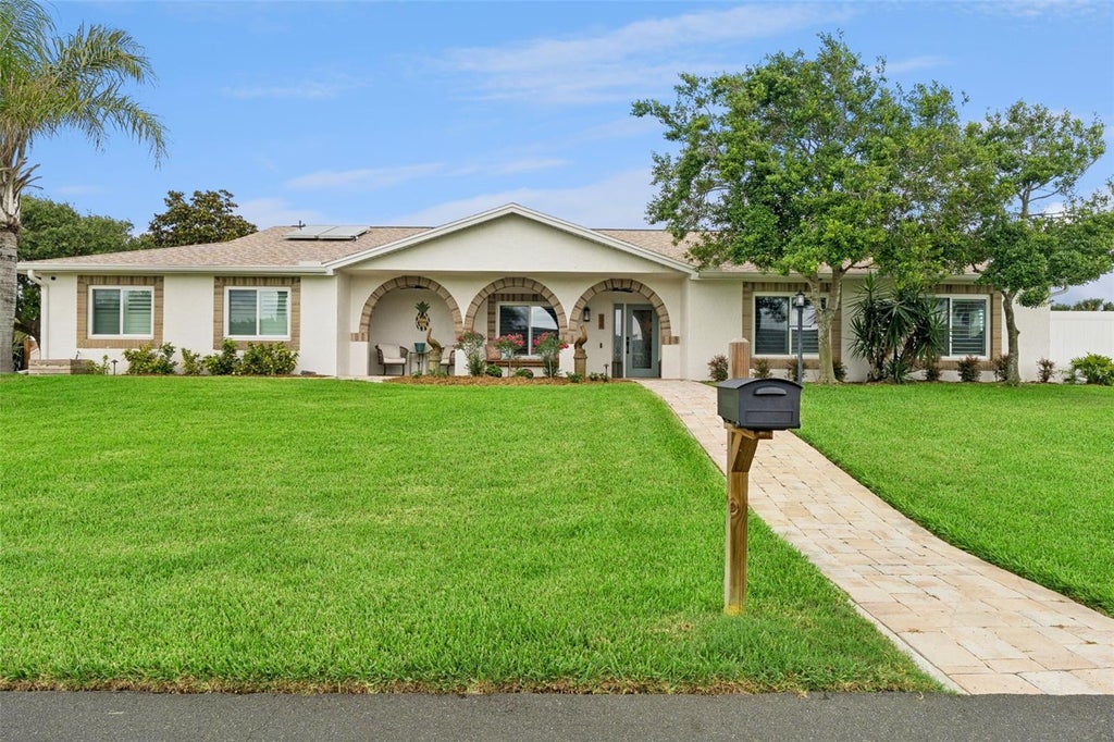 Photo of 52 Sea Island Drive N, Ormond Beach, FL 32176 (MLS # V4951180)