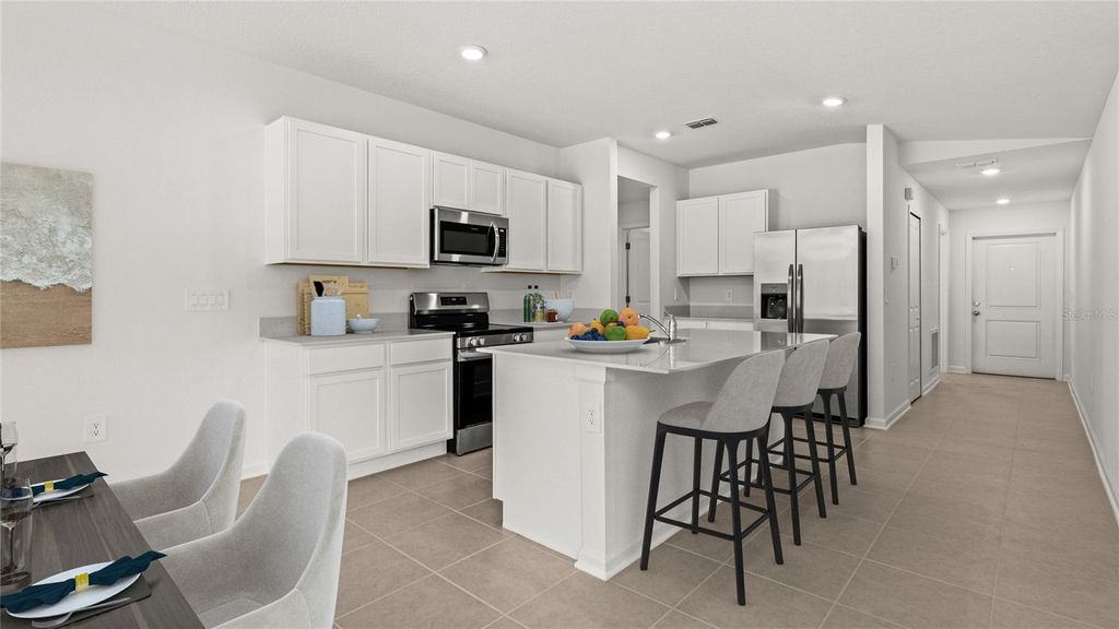 Photo of 1612 Willow Garden Loop, Eustis, FL 32726 (MLS # O6413924)