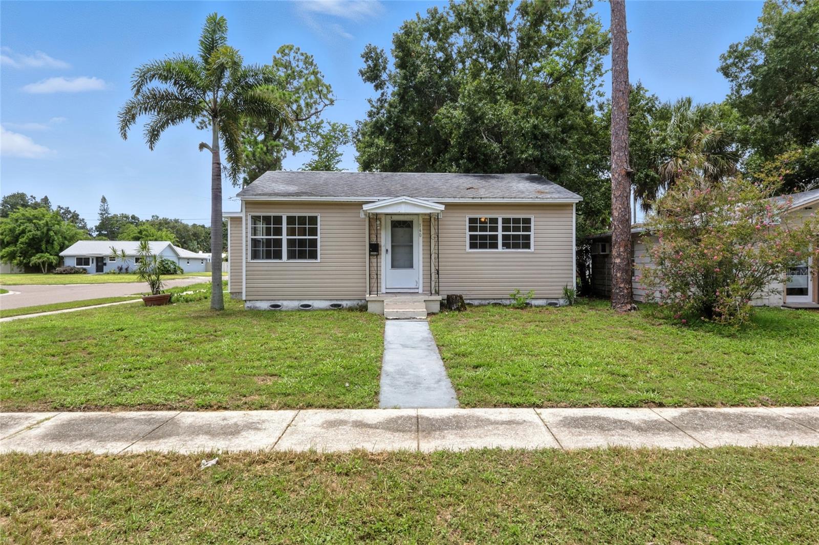 Welcome to an exceptional 3-bedroom, 1-bathroom, 1-car garage home on a premium corner lot with no HOA or CDD fees. This beautifully updated home in one of St. Pete’s most sought after neighborhoods offer’s the perfect blend of comfort, style, and function ! As you step up into the home you will first notice the fully renovated kitchen with brand new white shaker cabinets, Calcutta quartz countertops, a stylish tile backsplash and new stainless steel appliances. The bathroom features a tile shower/tub combo and a brand new 48” vanity with matching Calcutta quartz countertops. The rest of the home features high end luxury vinyl flooring and fresh paint on the entire interior including the ceilings. The third bedroom offers access to the backyard and can easily utilized as an office/flex space. Outside, the private fenced in backyard provides plenty of space for your furry friends along with additional storage with multiple sheds. Built high and dry this home suffered no hurricane related water damage, sure to offer peace of mind with the ever changing Florida weather. Located just minutes from downtown St. Pete, local parks, dining, and world-class beaches, homes like this are rarely available. Don’t miss out on this great opportunity !