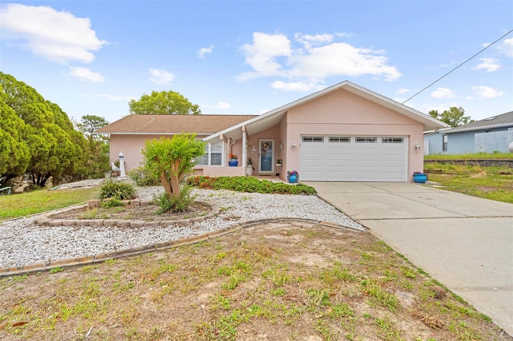 Photo of 13378 Drayton Drive, Spring Hill, FL 34609 (MLS # TB8496486)
