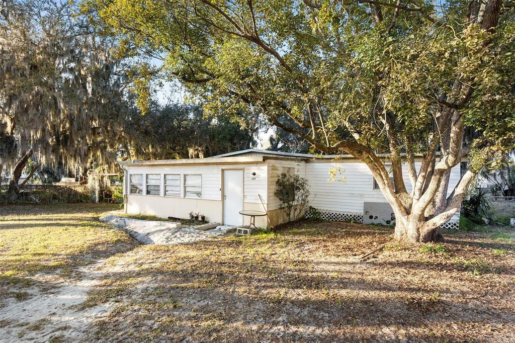 Photo of 3929 Country Place, Winter Haven, FL 33880 (MLS # O6378722)