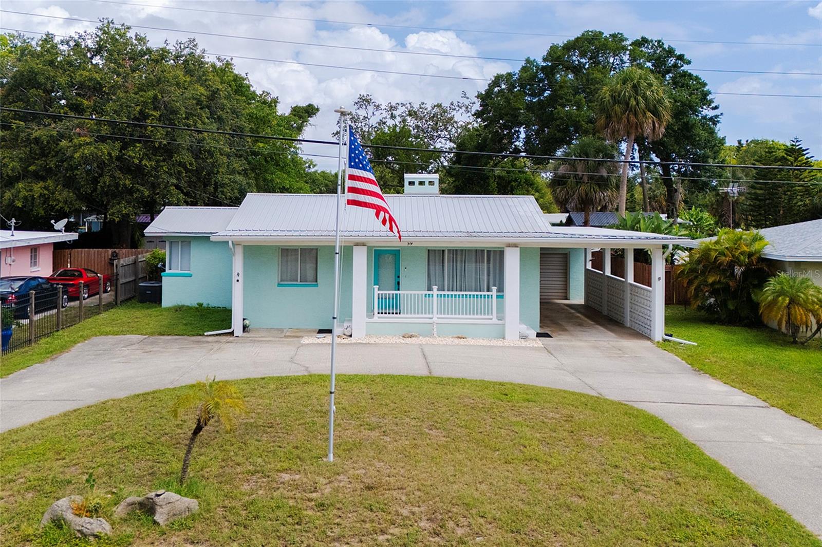Come take a look at this charming 3-bedroom, 3-bathroom inground pool home, ideally situated just 1.2 miles from the heart of Downtown Ormond Beach. Enjoy your daily drive or walk down scenic Beach Street, and take in the river views from your large circular driveway. Inside, you'll find an updated kitchen and primary bathroom, real hardwood floors, and a wood-burning fireplace. The spacious primary suite features french doors that open directly to the pool area and your private, fully fenced backyard. This home is perfect for both relaxing and entertaining, offering over 1,300 square feet of outdoor patio space, a large covered carport, a one-car garage, and even room to store a boat or RV. You'll love the location and convenience to nearby Cassen Riverfront Park & boat ramps, Riviera Park & playground, and a variety of shopping and dining options. Plus, you're less than 10 minutes from Ormond's no-drive beach! Best of all, this property is not located in a flood zone! Don't miss the opportunity to make this delightful pool home yours. Schedule a showing today!