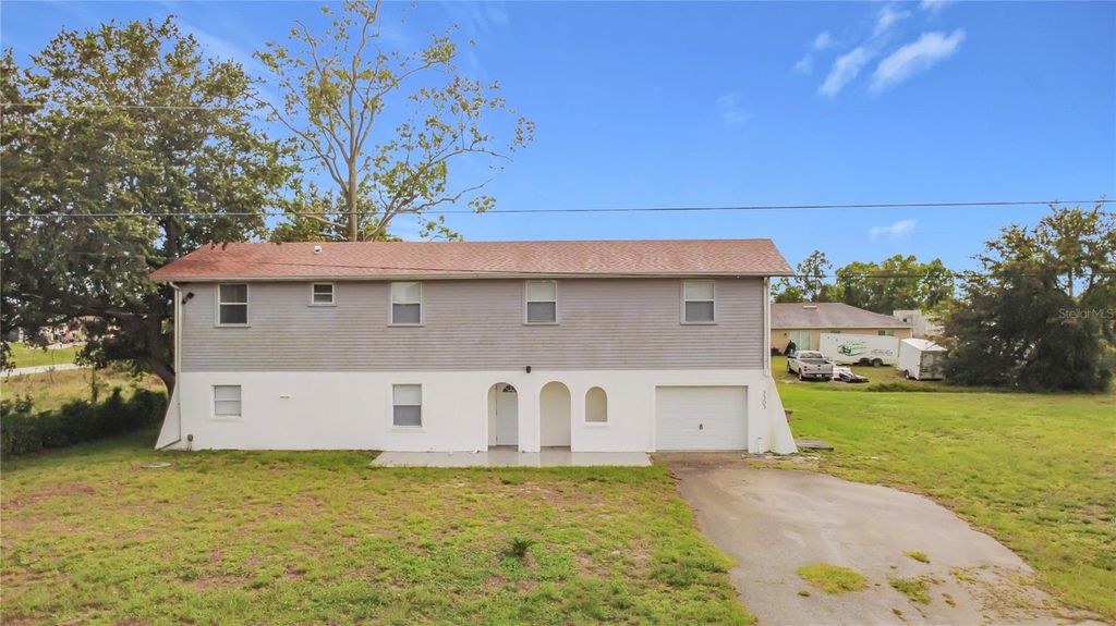Photo of 3303 6th Street SW, Lehigh Acres, FL 33976 (MLS # O6416637)