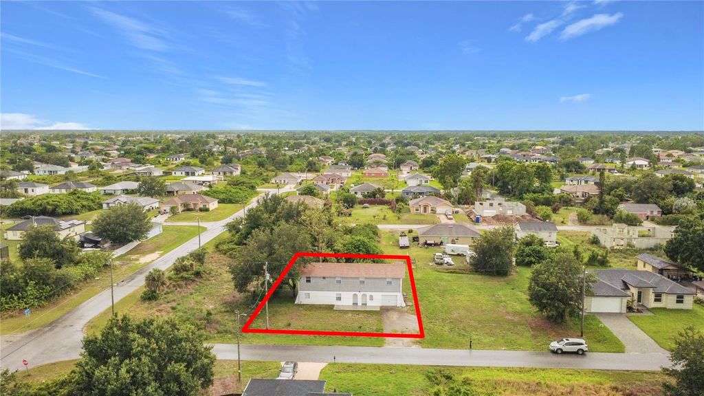 Photo of 3303 6th Street SW, Lehigh Acres, FL 33976 (MLS # O6416637)