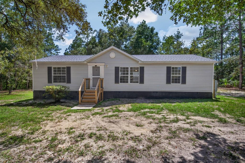Photo of 18870 SW 51st Lane, Dunnellon, FL 34432 (MLS # TB8550671)