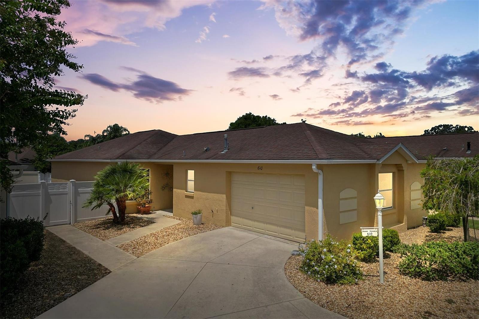 ~HVAC 2019~Water Heater 2024~ROOF 2014~NEW PAINT INSIDE AND OUT JULY 2025~Charming ONE OWNER HOME FOXGLOVE/CHARLOTTE Model Courtyard Villa in The Village of BONNYBROOK in CLIFTON VILLAS. ~LOW BOND BALANCE $2,779.24~This beautifully cared for 3 bedroom, 2 bath home offers the perfect combination of comfort, style, and low-maintenance living, ideal for those who desire a peaceful retreat with an open floor plan combined with a PRIVATE ENCLOSED COURTYARD, where sliding glass doors allow you to expand your living space inside & out. Great curb appeal with low maintenance rock, shrubs, full gutters and a sliding pocket screen door. Step inside to an open and airy floor plan enhanced by newer LVP flooring throughout the home…NO CARPET! The spacious living and dining area is filled with natural light, and large sliding glass doors seamlessly connect to the lanai and private courtyard. The kitchen is equipped with abundant cabinetry, STAINLESS STEEL APPLIANCES, GAS STOVE, BRAND NEW REFRIGERATOR and ample counter space, perfect for both casual meals and entertaining. The primary bedroom features a WALK-IN closet and a private EN-SUITE bath, while the two guest bedrooms offer flexibility for visitors, a home office, or craft room. The nearby guest bathroom has a convenient TUB/SHOWER combo and a hall closet. The INDOOR LAUNDRY includes the WASHER/DRYER, storage cabinets and utility sink. Enjoy the GLASS ENCLOSED overlooking the courtyard with an updated ceiling fan. The private, low-maintenance courtyard means less time spent on yard work and more time enjoying The Villages lifestyle. Sit outside and relax under the manual awning just off the dining room and enjoy the beautiful PLUMERIA TREE and the MEYER LEMON BUSH full of LEMONS.
In The Village of Bonnybrook you'll enjoy a recreation center right in the heart of your own neighborhood. it's the quickest way to get out and have some fun. The Churchill Downs and Pimlico Village Recreation Centers are both close, and offer family pools, bocce, shuffleboard, pickleball and tennis outside, with lovely billiards rooms, meeting rooms, and modern kitchen facilities inside. Bonnybrook golfers enjoy the convenience of three executive courses - Pimlico, Churchill Downs, and Belmont. And for a challenge, the Arnold Palmer Legends Country Club will test the ability of golfers of all skill levels. This is one of the best locations right around the corner from so many shopping centers with great choices including grocery stores, banks, gas stations, restaurants, softball fields, Costco, Walmart and so much more! THIS IS A LOVELY VILLA IN A GREAT LOCATION AT A GREAT PRICE…CALL NOW FOR YOUR PRIVATE SHOWING!
