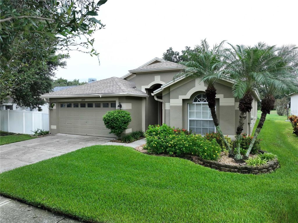 Photo of 34701 Pinehurst Greene Way, Zephyrhills, FL 33541 (MLS # TB8422481)