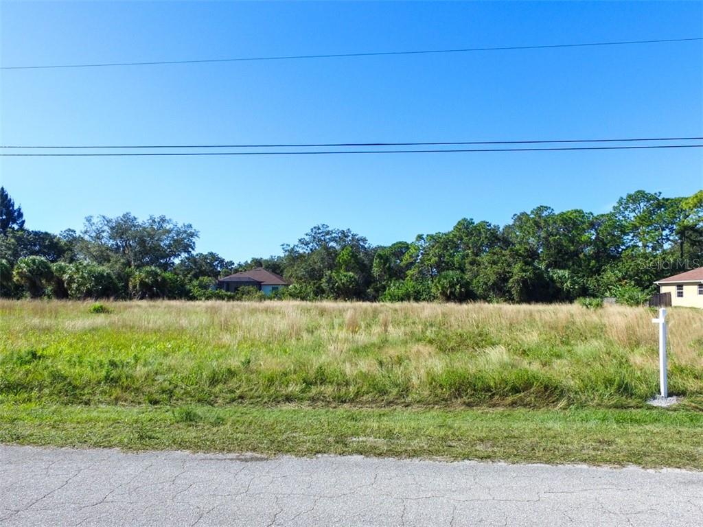 NOT FLOOD ZONE! ADDITIONAL LOT FOR SALE NEXT: LOT 8 N6140023 (for additional cost ask listing agent).
Investors Special! Oversized residential lot (RSF-3: Residential Single Family 3) in the Warm Mineral Springs neighborhood of North Port. This lot is within a short walking distance of the world-renowned Warm Mineral Springs, known world-wide for its healing waters!This Residential Lot sits in a quiet neighborhood minutes away from Warm Mineral Springs NOT IN A FLOOD ZONE or HOA or CDD. Excellent location, peaceful neighborhood, minutes from I-75 & Tamiami Trail! Convenient to Florida’s best beaches, golfing, public boat ramps, marinas, shopping, physicians, water park, Atlanta Braves Practice Stadium, Tampa Bay Rays Practice Stadium, Historic Riverfront Downtown Punta Gorda & Fishermen’s Village, and a short drive to Venice, Sarasota and Boca Grande, etc. All information deemed reliable, but not guaranteed; buyer to confirm all.