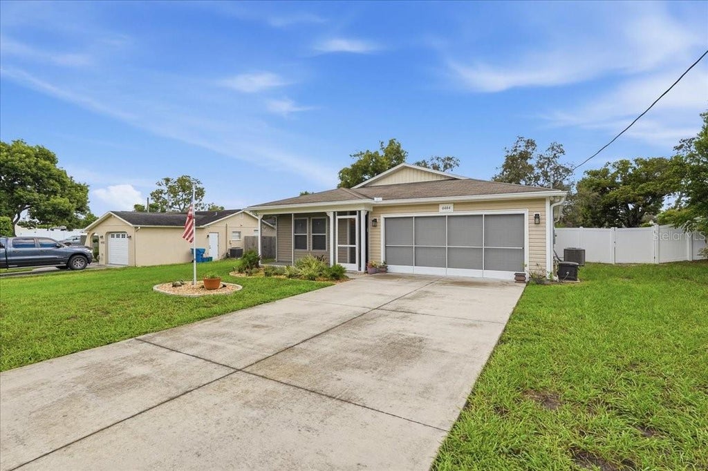Photo of 6464 Toledo Road, Spring Hill, FL 34606 (MLS # TB8547997)