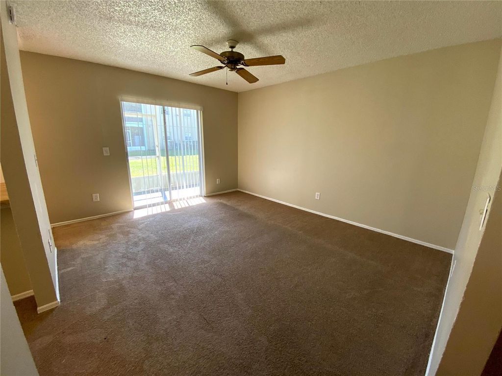 Photo of 4148 Pershing Pointe Place #1, Orlando, FL 32822 (MLS # O6390308)