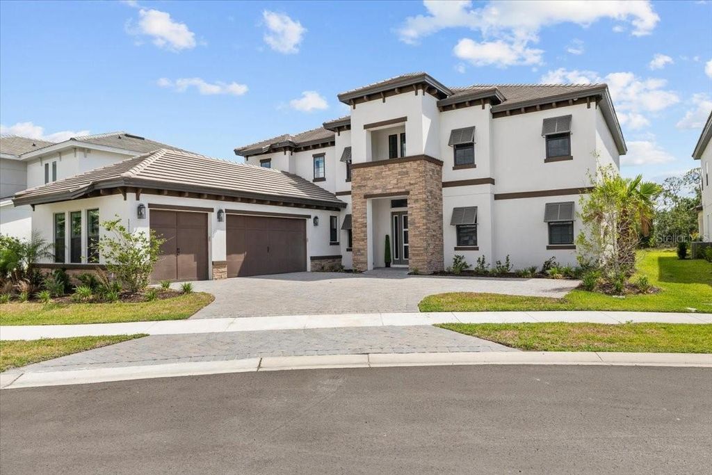 Photo of 33750 Ocean Spray Lane, Wesley Chapel, FL 33543 (MLS # TB8386397)