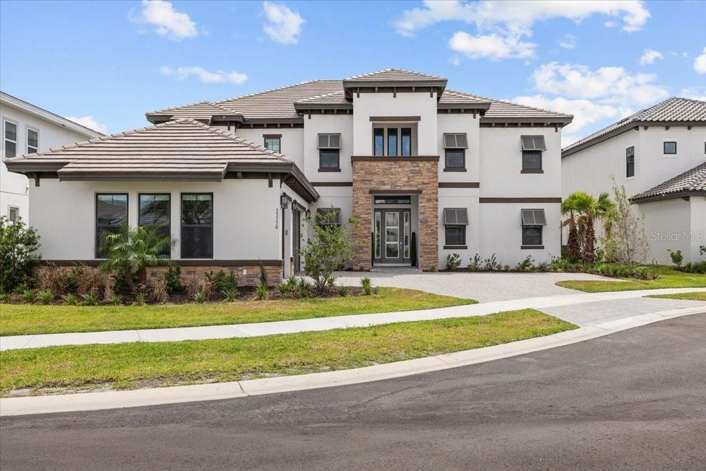 Photo of 33750 Ocean Spray Lane, Wesley Chapel, FL 33543 (MLS # TB8386397)