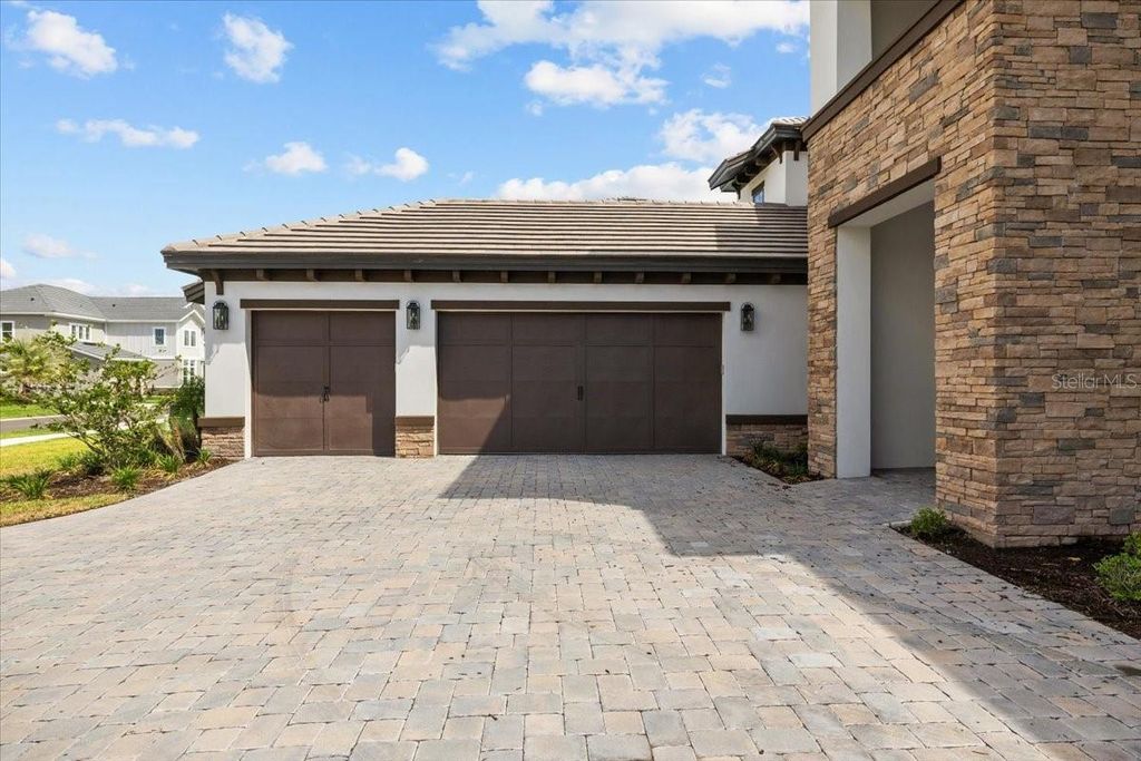 Photo of 33750 Ocean Spray Lane, Wesley Chapel, FL 33543 (MLS # TB8386397)