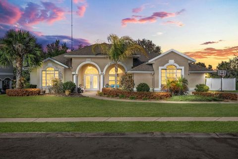 Photo of 424 Caddie Drive, Debary, FL 32713 (MLS # O6379305)