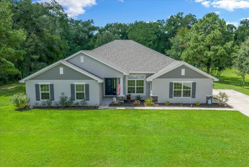 Photo of 140 NW 113th Circle, Ocala, FL 34482 (MLS # A4705118)