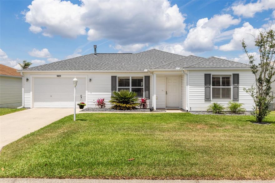Welcome to the Village of Sabal Chase!  This 2 BR, 2 BA Austin model is just minutes to Lake Sumter Landing and being offered TURNKEY!  This model combines modern upgrades, meticulous maintenance, and an UNBEATABLE LOCATION for those seeking the ultimate Villages lifestyle. NO CARPET! Newer vinyl plank floor throughout the home, providing durability and timeless style. The kitchen is bright and open with lighter color cabinets, a sit at bar, all white appliances with a GAS stove! The cozy living room has modern Florida decor, ceiling fan, and PLANTATION SHUTTERS! The master bedroom has a private slider to screened lanai, large walk-in closet, and an en-suite bathroom. The master bathroom has a newer toilet, and shower was just beautifully updated in December. The guest bedroom also has a walk-in closet, PLANTATION SHUTTERS, and ceiling fan. Guest bathroom has a newer toilet and tub/shower combo.  Newer washer and dryer.  The big- ticket items have been taken care of, so you don't have to... ROOF 2025, A/C 2023, and HWH 2020! The garage has plenty of room for a car and golf cart.  Speaking of golf cart, a Yamaha gas golf cart is available for a separate purchase making this home a truly turnkey possibility. This home was used as a part time AIRBNB with 5-star reviews and accommodations. Walkable to Sumter Landing and Sabal Chase pool is at the end of the street! So, if you are looking for an investment property with a proven track record, or a home where you need to bring just a toothbrush, then this home is for you! Schedule a showing today to experience this gem first-hand, and to see why the villages is so extraordinary.