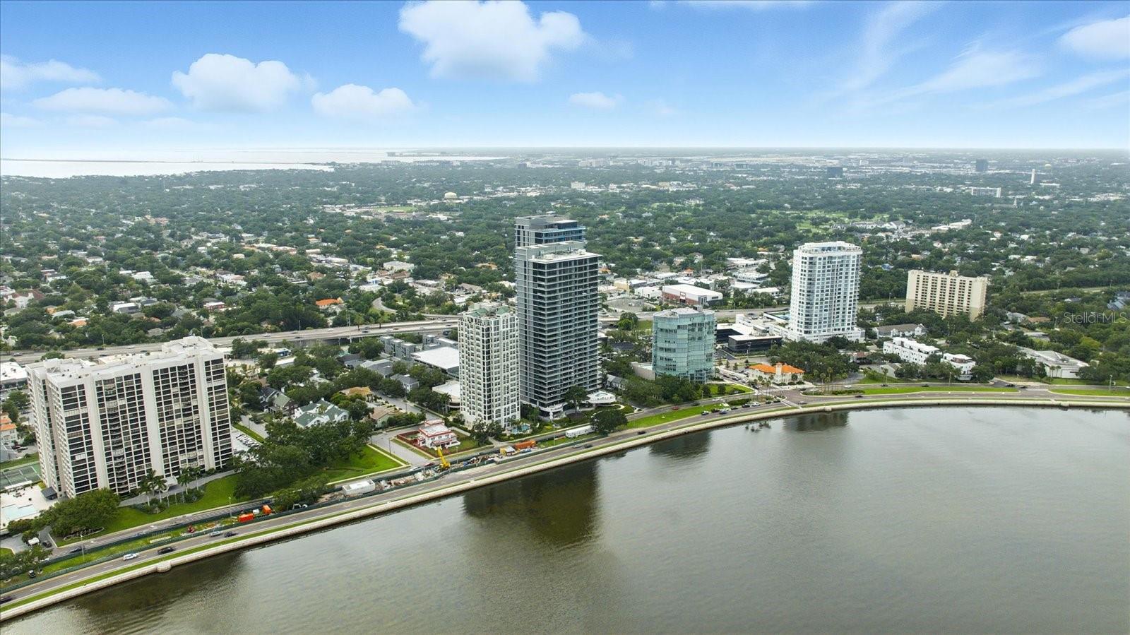 Experience Unparalleled Waterfront Luxury at the Ritz-Carlton Residences, Tampa
Welcome to the epitome of sophistication on iconic Bayshore Boulevard. This impeccably designed 3 bedroom+ den/office residence at the Ritz-Carlton offers breathtaking, unobstructed views of Tampa Bay, seamlessly blending world-class architecture with timeless elegance. Step off the elevator into your gorgeous private foyer with custom wall covering setting the tone of the Ritz lifestyle. Custom built-in closets with library ladder in the primary suite to access all of your personal treasures. Custom built-in marble wet-bar with ice maker, refrigerator drawers, & SUBZERO 108 bottle wine refrigerator makes this stunning addition extra special and a unique standout from other units in the building. Expansive floor-to-ceiling windows with electric black out shades in every room, a private wrap-around terrace, custom built-in bookcase in the den, and refined interior finishes curated by renowned designers, this home is a true sanctuary in the sky.
Enjoy a chef’s dream kitchen with premium appliances, spa-inspired baths, and spacious living areas designed for both relaxation and entertaining. The Ritz-Carlton lifestyle includes 24-hour concierge, valet, and security, along with exclusive resident amenities such as a resort-style pools, state-of-the-art fitness center, private wellness spa, jacuzzi, continental breakfast, and club-level lounge area. Looking to entertain the kids, come visit the private play area designed just for kids, and do not forget to spend some time perfecting your swing in the golf simulator suite too!
Just moments from Hyde Park, downtown Tampa, fine dining, and cultural venues—this residence offers a rare blend of privacy, prestige, and panoramic views. Discover luxury redefined in Tampa’s most prestigious address
ONE YEAR OF HOA FEES PAID BY SELLER with acceptable offer and closing to occur no later than September 30, 2025