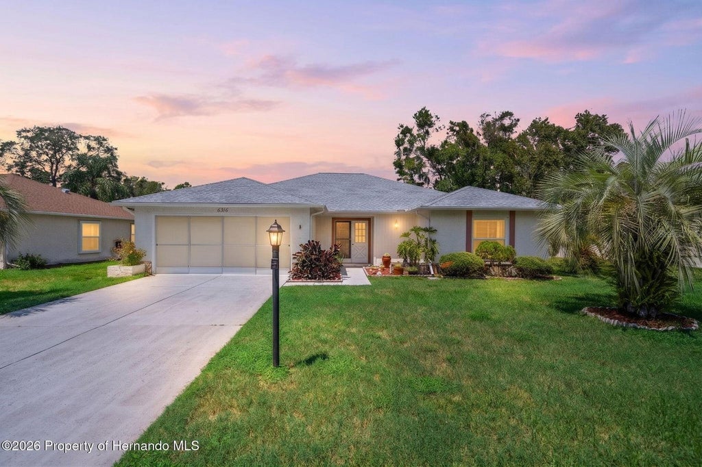 Photo of 6316 Ocean Pines Lane, Spring Hill, FL 34606 (MLS # J1005565)