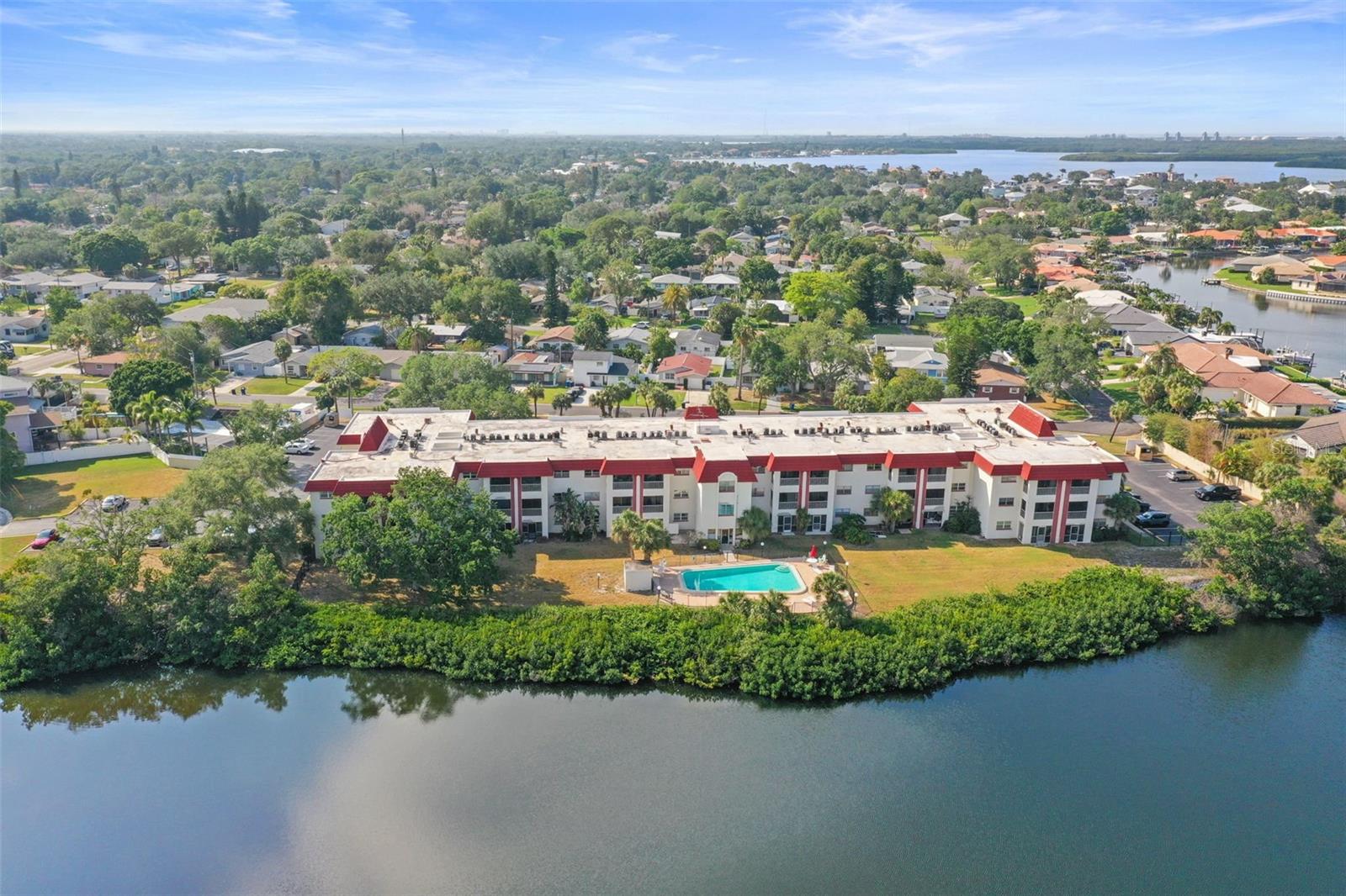 Welcome to The Regency, a pet-friendly and investor-friendly community in the heart of St. Petersburg. This spacious 2-bedroom, 1-bath corner unit sits on the second floor with tranquil lakefront views, California Closets, and two reserved parking spaces.
The community is all-ages and allows immediate leasing—perfect for investors or homeowners looking for flexibility. Residents enjoy a sparkling pool, laundry on each floor, convenient bike storage by the elevator, and peace of mind knowing the building recently passed its Phase I milestone structural inspection and has strong reserves.
The affordable HOA covers water, sewer, trash, building and flood insurance, plus exterior maintenance—making this an excellent value. Pets are welcome (one dog under 20 lbs or two cats).
Whether you’re looking for your first home, a vacation getaway, or a smart investment, this condo checks all the boxes.