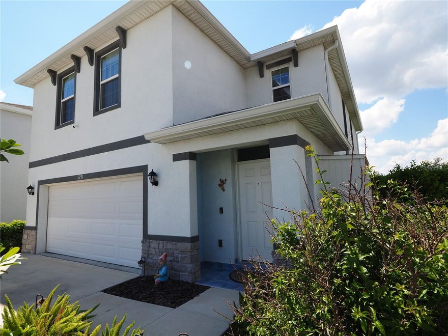 This spacious two story home all-concrete block construction has been thoughtfully upgraded and is located in the coveted Star Farms community. The home boasts 4 bedrooms and 2.5 bathrooms and 2992 sqft under roof as well as oversized 990 sqft screened lanai with a top of the line 3 person Caldera Spa, custom lighting and an expanded driveway. The home features ceramic tile and crown moldings  throughout the first floor living area and kitchen. The stairs and all second floor bedroom floors were upgraded to engineered wood. The kitchen features an ornamental backsplash, stainless steel appliances, under cabinet lighting and a vent that has been ducted to the outside, as well as reverse osmosis filter that compliments n oversized, self cleaning whole house filter and water softener. The 5'8"x14' storage area has been converted into an additional pantry and equipped with shelving and extra lighting.as well as state-of-the-art Smart Home Automation system. The home has gutters and the garage has been insulated and air conditioned as well. The dowstairs guest bathroom has been updated with a cabinet, granite counter and attractive wallpaper. Faucets were upgraded to Moen and the master bathroom shower features a glass door.   The Resort Club amenity center includes Coffee Kitchen, Resort Style Pool, Fitness Center, Athletic Performance Center, and Pet Park,  Poolside Bar & Grill, Outdoor Activities Area, The Event Center, and The Terrace Chef’s Patio. Future amenity centers, Junction Place & Cabana Corner, will include a Baseball Field, Tennis, Pickleball & Basketball Courts, Golf Cart Parking, Playground, Clubhouse, Resort Pools & Splash Pad, Poolside Cabanas, Sand Volleyball, Poolside Grilling, Pet Park and more.