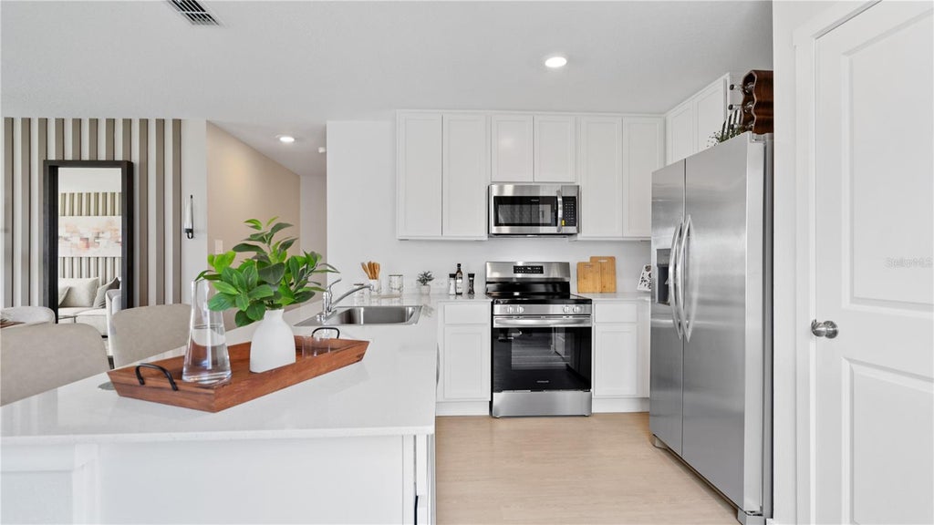 Photo of 2711 Ginger Lane, Haines City, FL 33844 (MLS # O6444757)