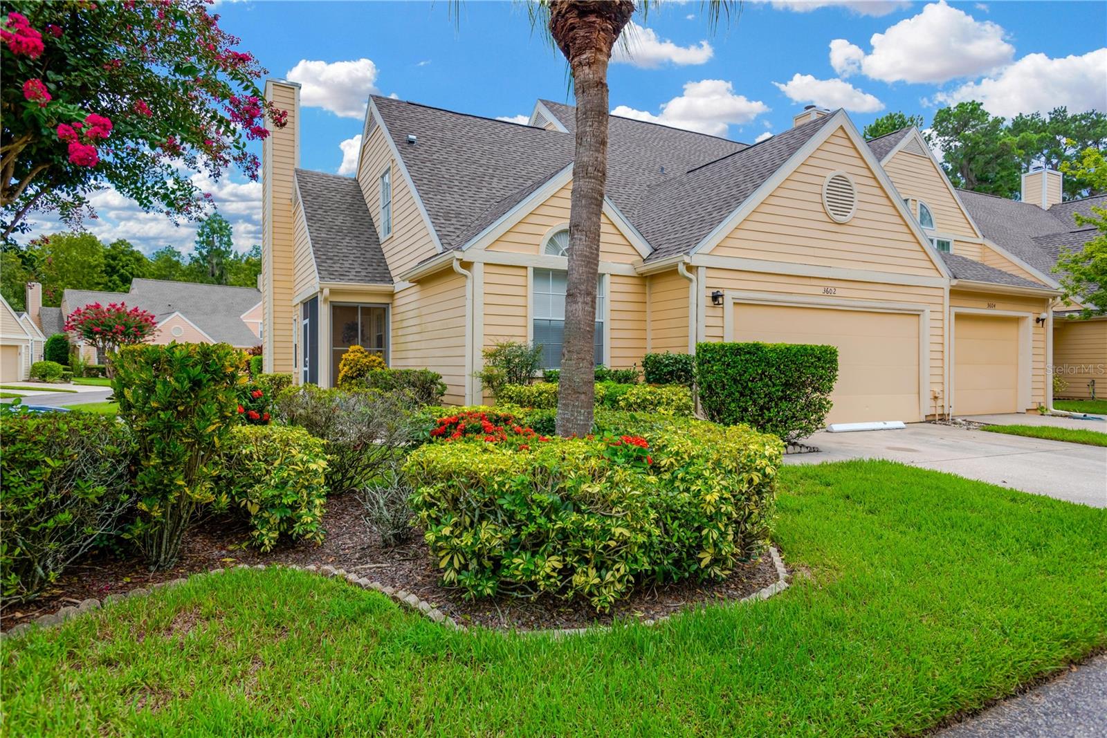 MAINTENANCE FREE LIVING in this Charming 3 Bed/2 Bath Corner-Unit Townhome in one of the Most Sought-After neighborhoods AND AREAS with TOP RATED SCHOOLS!! You can relax and watch the Sun set from your Screened Front Porch OR sip a cup of coffee in the morning in the Screened Year-Round Florida Room and enjoy the Sun rise! Walking through the front door you’ll be greeted by Vaulted Ceilings, an Open Staircase, a Spacious but Cozy Living Room with Wood Burning Fireplace, and an Open Kitchen with Stainless Steel Appliances, ample Counter Space and Dining Area. The Primary Bedroom Suite is conveniently located on the first floor, while the 2nd & 3rd Bedrooms are upstairs on the second floor. If you need Extra Space, this is the Unit for you! The Garage has been converted (Including AC & Heat) to a Very Large Versatile/Flex Room! It’s perfect for a Recreational Room, Office, Extra Bedroom, Man Cave or whatever your heart desires! In the “Flex Room” is a Laundry and Storage Closet. Moving up the stairs you’ll find an Open Loft Area overlooking the Living Room ~ this area is also considered the 3rd Bedroom and has a Large Walk-in Closet. If you don’t need three bedrooms, this is an ideal space for an Office or Reading Room. Also on the second floor, you’ll have a Full Bathroom and the Good-Sized 2nd Bedroom. You’ll be able to get plenty of use spending time in the “Florida or Year-Round Room” looking out to the back yard. Equipped with Screens to let the cool fresh air in during the Winter, but also has windows to keep the hot air & humidity of the Summertime out! If you like to Swim or Sunbathe by the Pool, you can head over to the Pine Grove Community Pool – just steps away. You’ll have lots of extra time in your day because Lawn Mowing, Shrub Trimming, Fertilizing, Weeding & Watering is all taken care of for you! HOA also covers Roof Replacement (recently done in 2023), Exterior Painting, Pool & Grounds Maintenance, and includes Water, Sewer, & Trash Pick-up. This Location couldn’t be any better! So close to plenty of shopping, great restaurants, schools, banks and much more! This Home is Ready to welcome you and is waiting for Your Personal Touch! Don't Wait!