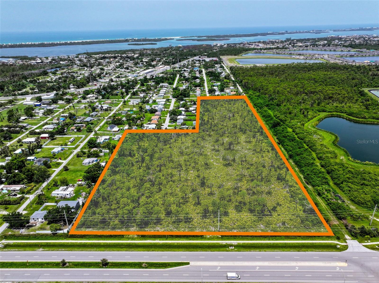 Located in the beautiful Englewood, Florida area lies this 15 +/- Are development site with frontage on the new Winchester Boulevard Extension. This new extension is the north-south connector bisecting historic Englewood from Englewood East and Rotonda as a new Central Boulevard. It provides access to South River Road (connecting to Interstate-75) and Placida Road to the south giving access to the world-famous Boca Grande.
This offering consists of one to three parcels for development into retail, multi-family, or both. Opportunities consist of either purchasing the entire site for retail development as it is already zoned CG - Commercial General, or multifamily development under the Florida Legislature's Live Local Act allowing multi-family development without a rezoning provided certain affordable housing criteria are met.
Seller will also subdivide as two 1.2 +/- Acre future corner retail development sites with frontage on Winchester Boulevard and one 12.6 +/- Acre site that could be used for Multi-Family Development with partial frontage on Winchester Boulevard and partial frontage on the future Cypress Road.
The multi-family residential site is located in an area that can utilize the Residential live local zoning allowing for apartments or a build-to-rent community on the site. Recent revisions to Live Local in 2025 assures that Charlotte County's "Transfer Density Unit" program does not impair implementation of the Live Local Act.
The 1.2+/- acre retail sites at the corner of Winchester Boulevard and Cypress Road could have the potential to be at a future traffic light. The lots are zoned Commercial General (CG) allowing for a variety of uses including Bank, Pharmacy, Gas Station, Retail, Car Wash, Restaurant, among others.
15 +/- total acres with Seller willing to subdivide into three lots:
Parcel A: 1.2 +/- Acres - $875,000 Corner Lot Retail Parcel
Parcel B: 1.2 +/- Acres - $775,000 Retail Parcel
Parcel C: 12.5 +/- Acres - $4,950,000 Multifamily Parcel
TOTAL: $6,600,000 for Entire Site