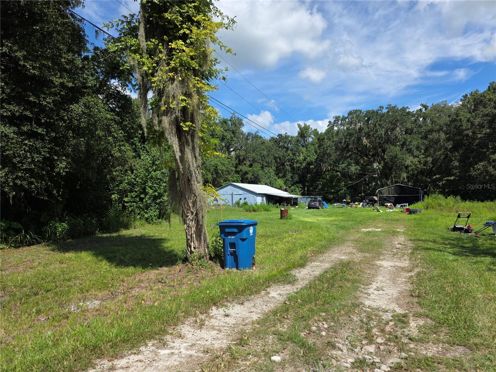 CHECK THIS OUT!!! Zoned Agricultural, this 10.1+ Acre lot has so much potential. The first home on the property is a 2/1 with a brand new roof but is truly an investor special because it needs a full Renovation!!
There is a Mobile/RV that needs to removed from the property and other items but the potential for this Property is AMAZING!!! There are several Sheds, Storage Containers, Carport type buildings with a lot of stuff inside & around.
So INVESTOR SPECIAL with ENDLESS OPPORTUNITITES!!!! Check it out today!!
