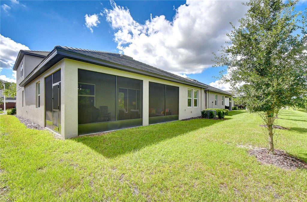 Photo of 10577 Banyan Breeze Boulevard, Land O Lakes, FL 34638 (MLS # TB8545542)