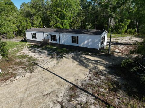 Photo of 1400 NW 62nd Place, Bell, FL 32619 (MLS # GC527728)