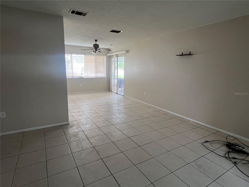 Photo of 334 Aylesbury Lane NE, Port Charlotte, FL 33952 (MLS # C7513778)