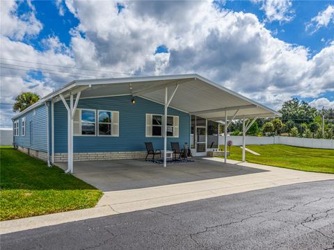 Photo of 4050 Carefree Way, Zephyrhills, FL 33541 (MLS # TB8436053)