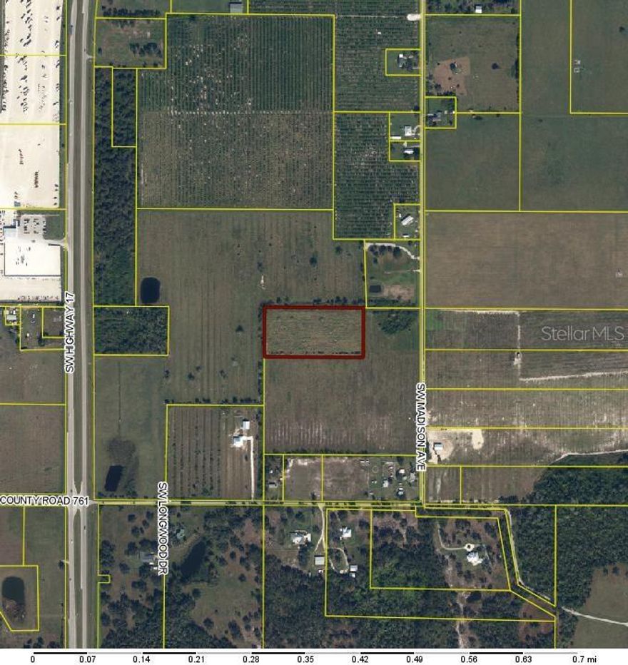 5+/- Acres in Fort Ogden! Rectangular site, fully cleared and fenced with a 550' deep well. Accessed by a deeded 60’ easement, conveniently located halfway between Punta Gorda and Arcadia. Zoned agriculture, bring all your animals and build your dream home with plenty of room for a barn!