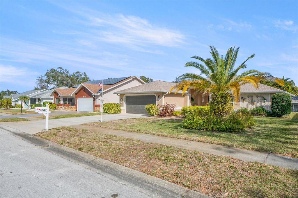 Photo of 1563 Wicklow Drive, Palm Harbor, FL 34684 (MLS # TB8467874)
