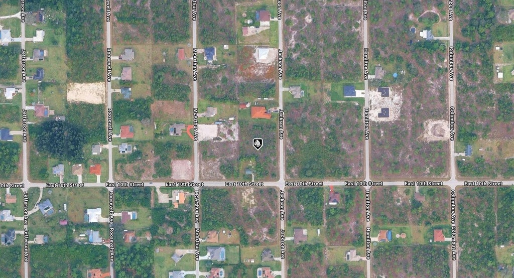 Photo of 1003 Jackson Avenue, Lehigh Acres, FL 33972 (MLS # A4707943)