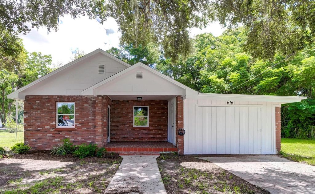 Photo of 616 Powell Street, Wildwood, FL 34785 (MLS # W7879853)