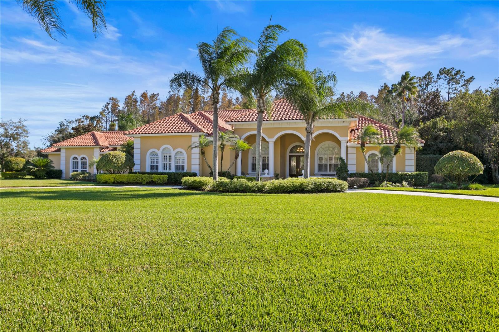WELCOME HOME FOR THE HOLIDAY'S! Introducing 4701 Cheval Blvd an exquisite luxury estate nestled in the highly sought after Gated Community: Cheval Golf and Country Club in the STEINBRENNER SCHOOL DISTRICT. This opulent ONE OF A KIND residence features 4 EN SUITE bedrooms in the main house plus an ADDITIONAL SEPARATE IN-LAW SUITE complete with full bath, bedroom, kitchenette (2014) and private access (making total sq ft just under 6100) as well as a 2nd additional 3-car garage (2014), GIVING YOU A TOTAL OF 6 CAR GARAGE for your car enthusiast. Step into a grandeur of space where the large living room and dining room seamlessly converge, featuring 12 ft ceilings that amplify the sense of opulence. Crown molding and tray ceilings add an extra layer of sophistication to this open and airy design. Newer UPDATED KITCHEN with an abundance of storage and large family room make entertaining seamless. The GAME ROOM/ BONUS ROOM is both stylish and versatile perfect for entertaining guests or just unwinding. Immerse yourself in an unparalleled cinematic experience in the PRIVATE THEATER ROOM and watch a movie on the big screen or work off some steam in the GYM. Experience luxury beyond the interiors with an oversized lanai, inviting pool, spa, and a nicely equipped outdoor kitchen. Entertain effortlessly with an outdoor bathroom and relish the convenience of a small fenced-in area for pet lovers featuring artificial grass. Step into a world of tranquility surrounded by meticulously landscaped grounds, offering a serene oasis for relaxation and entertainment. Enjoy the privacy and natural beauty of this 1-acre conservation property. This extraordinary estate offers an unparalleled fusion of sophistication and comfort. AC’s 2014 & 2023, HOT WATER HEATERS 2022, OUTDOOR KITCHEN UPDATE 2018 and ROOF CERTIFICATION. A Rated schools, close to shopping, restaurants, highways and airport.