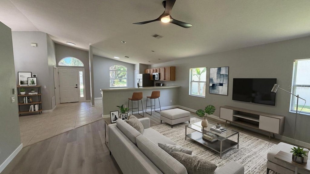 Photo of 649 Macon Drive, Titusville, FL 32780 (MLS # O6427073)