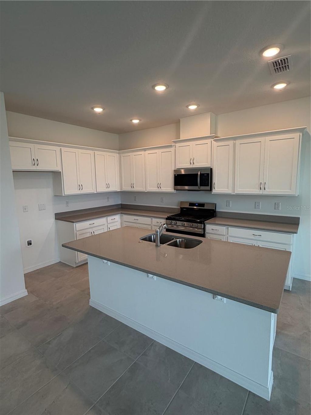 Photo of 24546 Hodges Reserve Avenue, Howey In The Hills, FL 34737 (MLS # O6390762)