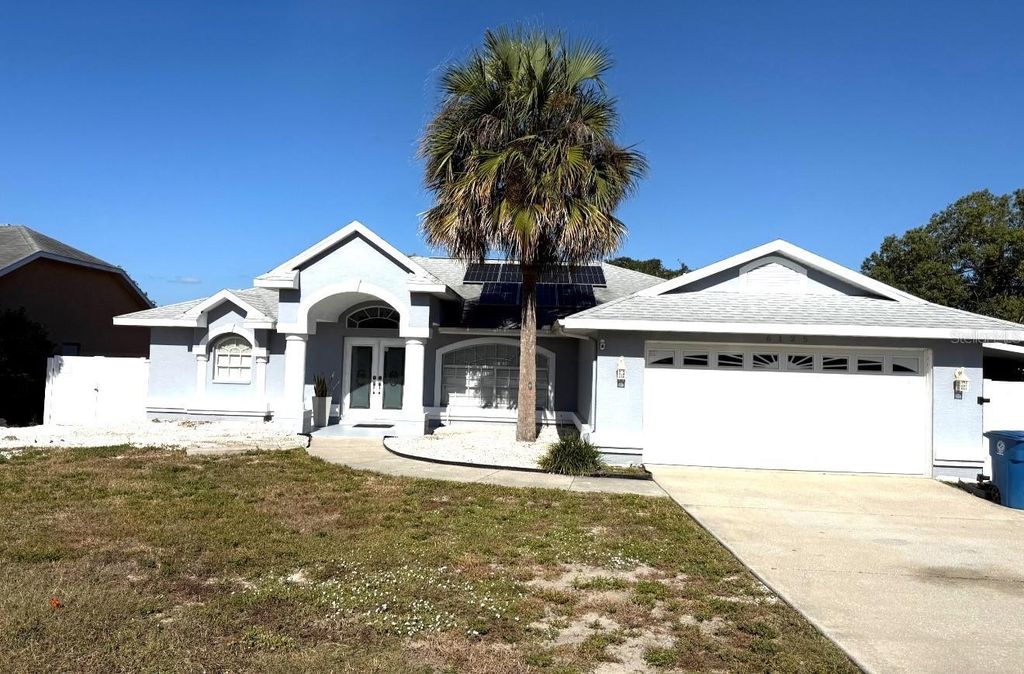 Photo of 6125 Mariner Boulevard, Spring Hill, FL 34609 (MLS # TB8440170)