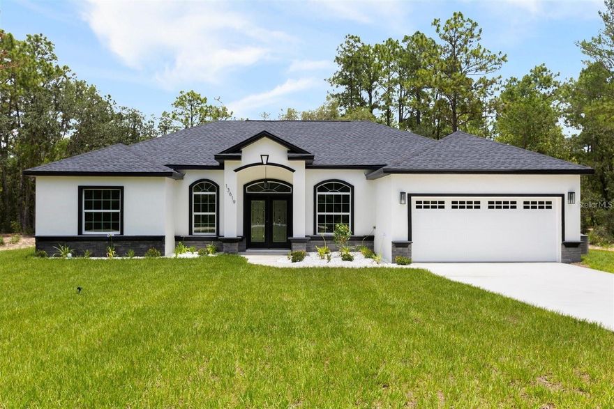 NEW CONSTRUCTION 3/2 HOME ON 1.12 ACRES – NEAR WEC – NO HOA OR CDD! Location: Minutes from the World Equestrian Center (WEC) 3
Bedrooms | 2 Bathrooms 1,886 SF Under Air | 2,611 SF Total 1.12 Acre Lot | No HOA | No CDD Welcome to the best of Florida living! This brand new, custom-built 3-bedroom, 2-bathroom home sits on a spacious 1.12-acre lot, offering privacy, freedom, and elegant design — all just minutes from the World Equestrian Center. 
Features & Highlights: Open-concept layout with high ceilings and natural light Gorgeous shaker-style kitchen cabinets and large butler’s pantry 
Beautiful stone accents and upgraded ceiling fans throughout Spacious primary suite with walk-in closet and spa-style bath Covered patio, oversized driveway, and 2-car garage Tons of outdoor space for future additions, toys, animals, or a pool No HOA. No CDD. No Restrictions. Bring your vision to life with this versatile property — perfect for anyone seeking peaceful living near Ocala’s premier venues.
