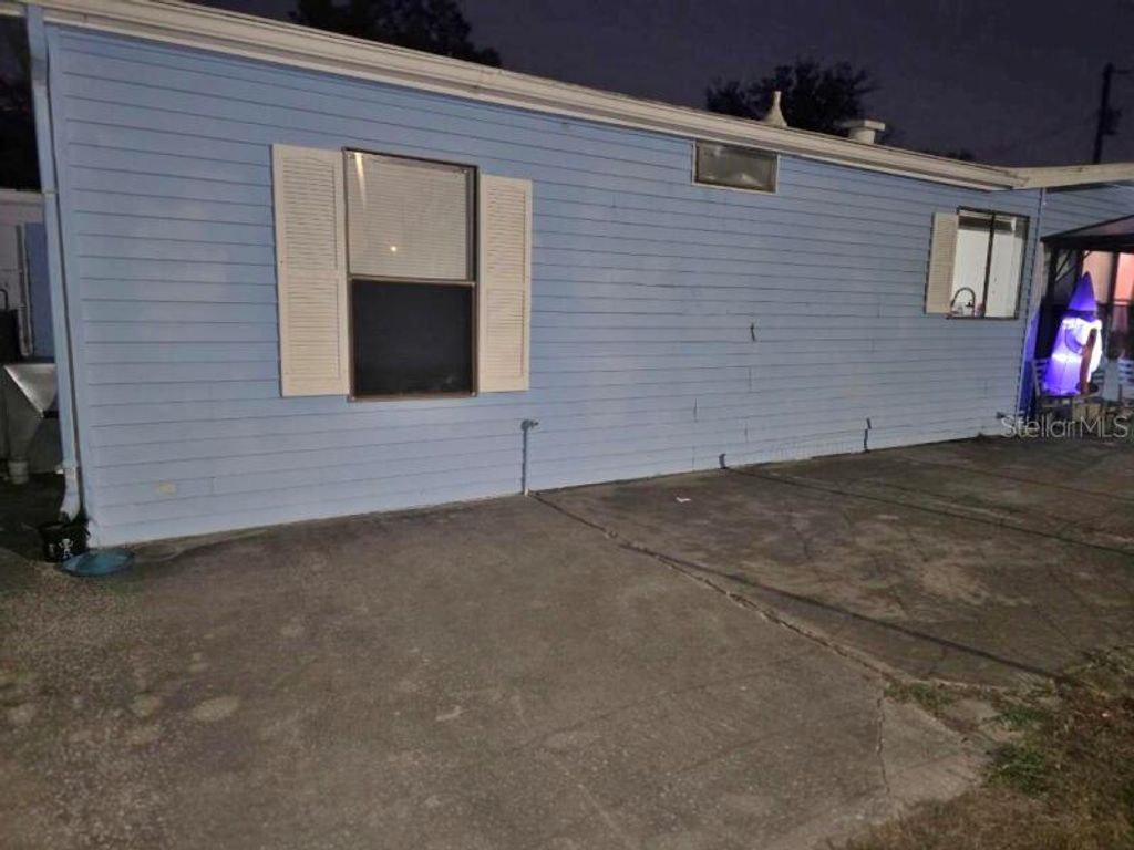 Photo of 13126 Hicks Road, Hudson, FL 34669 (MLS # O6364154)