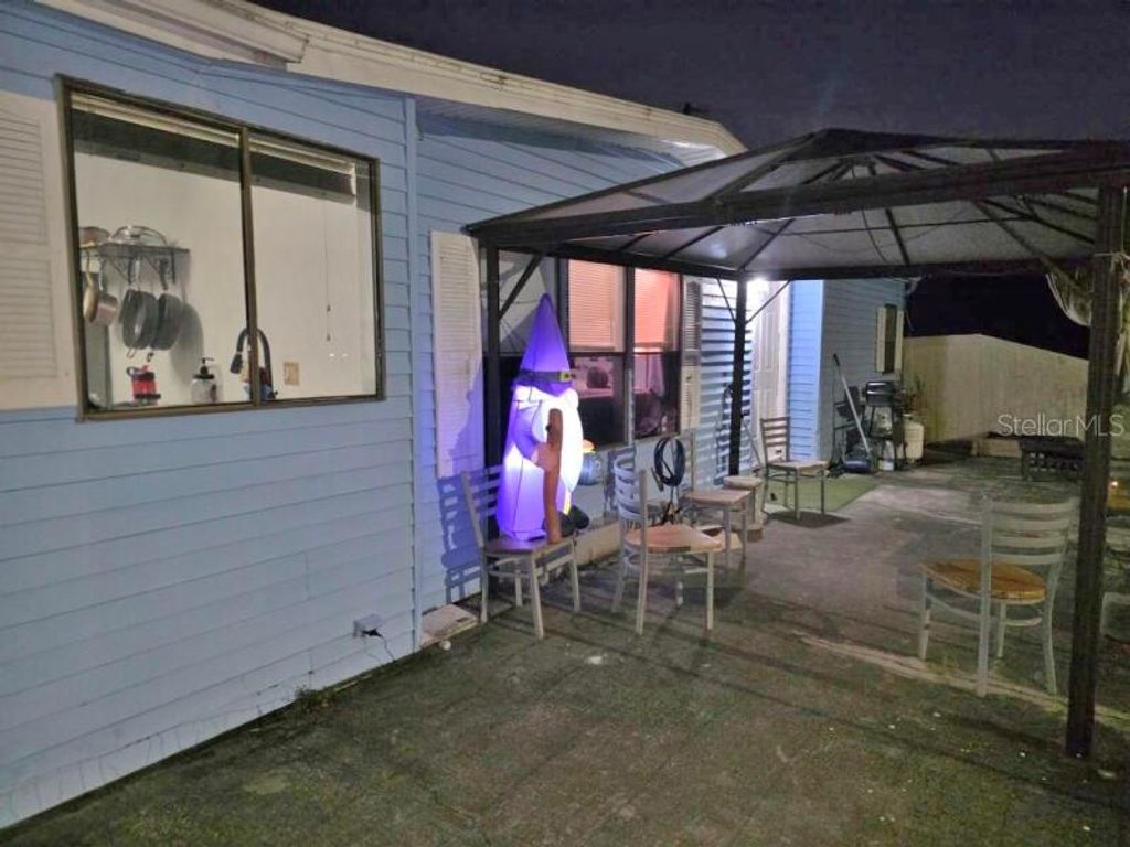 Photo of 13126 Hicks Road, Hudson, FL 34669 (MLS # O6364154)