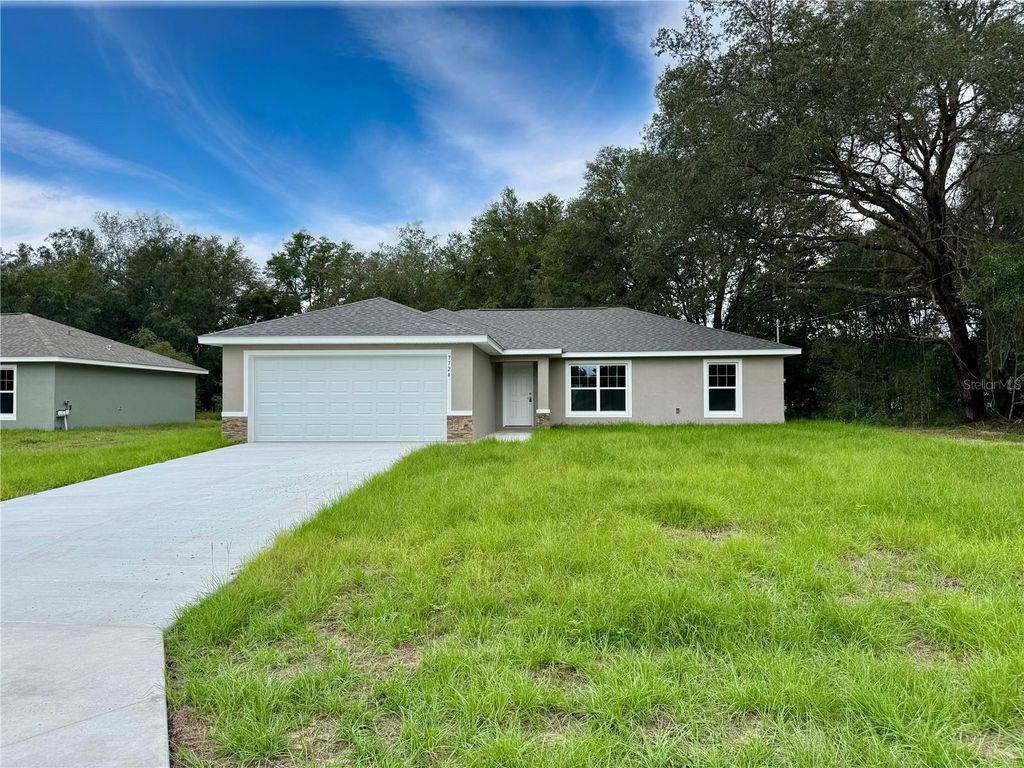 Photo of 7724 N Manville Road, Citrus Springs, FL 34434 (MLS # OM706493)