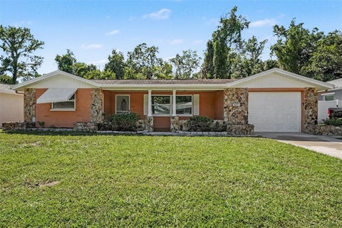 Photo of 2641 Flintwood Drive, Holiday, FL 34690 (MLS # O6438494)
