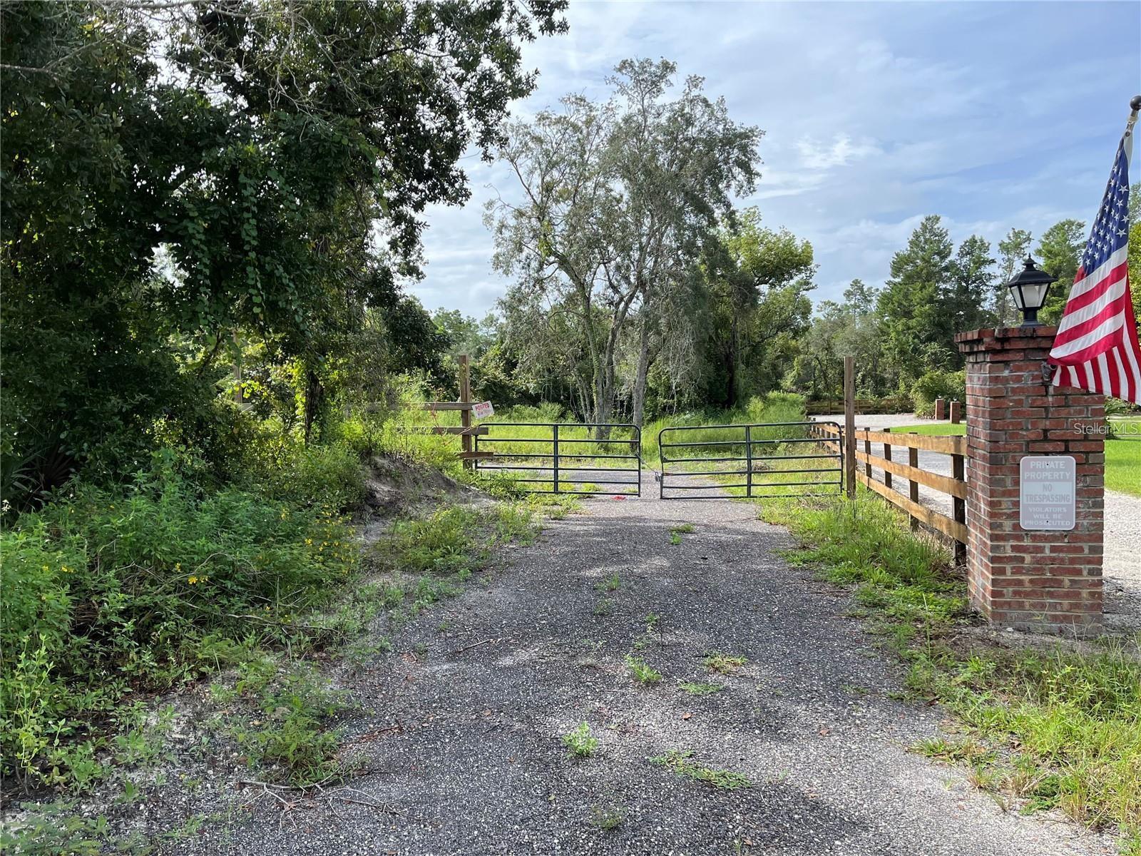 MUST SEE 2.5 ACRES ideal for a large custom home! Nice future homesite located at the end of a dead end street for additional privacy yet within close proximity to stores, schools and the interstate. Property is partially cleared and has an existing well (serviced and new pump installed in '22). Zoning allows for horses. Not in a flood zone. Survey available. This is one to see if you are looking for acreage in Deltona.