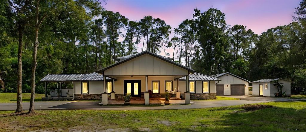 Photo of 28042 Lindenhurst Drive, Wesley Chapel, FL 33544 (MLS # TB8435109)