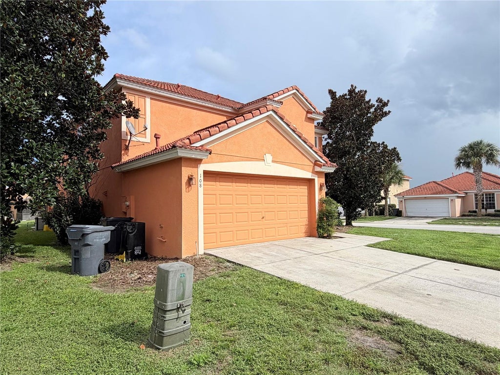 Photo of 108 Miro Drive, Davenport, FL 33837 (MLS # O6445347)