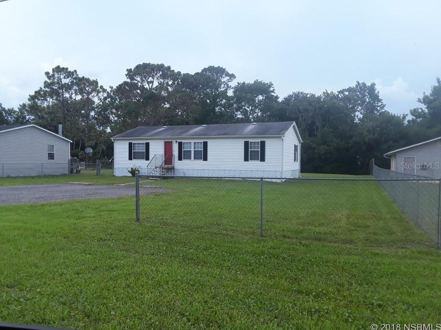 Don't miss this immaculate 3 br, 2 bath on large lot in New Smyrna Beach. Well maintained home with new flooring and paint, split bedroom plan and large driveway. Within walking distance to the new bike trail. ;Water: City