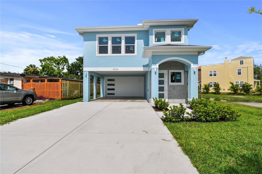 Stunning New Construction Home on a Prime Corner Lot in Bayou Bonita!
Welcome to your dream home in the highly coveted Bayou Bonita neighborhood, just moments from the scenic Coquina Key Island. Now featuring the entire corner lot, this property offers enhanced space, added privacy, and undeniable curb appeal that sets it apart.
This exquisite modern residence boasts over 2,000 sq. ft. of elevated luxurious living space, with breathtaking partial water views from the primary suite that will stop you in your tracks.
Designed with contemporary elegance in mind, this brand-new home seamlessly blends sophistication, comfort, and peace of mind—built above flood requirements. It offers 3 spacious bedrooms, 2 full baths, and a convenient half bath, with every detail thoughtfully curated.
As you approach, the expanded corner lot makes an immediate impression. A lush, manicured lawn wraps the property, offering additional outdoor space and flexibility. The oversized driveway and tandem 4-car garage provide ample room for vehicles, boats, jet skis, or whatever your lifestyle demands. The charming front door portico, accented with coquina shells, creates a warm and distinctive welcome.
Inside, luxury water-resistant vinyl plank flooring flows throughout the main living areas and bathrooms. The heart of the home features a sleek, modern kitchen with quartz countertops and Samsung white glass smart appliances, opening effortlessly into the family and dining spaces—perfect for entertaining or everyday living.
The primary suite is a true retreat, complete with a spa-like ensuite bath, generous walk-in closet, and those captivating water views. Two additional bedrooms offer ample space and storage for family or guests.
A dedicated laundry room adds convenience, tucked just off the expansive living area.
Located just a 5-minute walk from Bay Vista Park, you’ll have easy access to the waters of Coquina Key, nearby boat ramps, and endless outdoor recreation. Plus, you’re only minutes from the energy of downtown St. Petersburg—dining, shopping, culture, all within reach.
Corner lot. New construction. Water views. Elevated living.
This is the one.

Don’t miss your opportunity—schedule your private showing today.